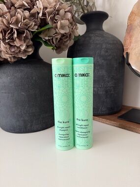 amika The Kure Strength Repair Shampoo​ and conditioner